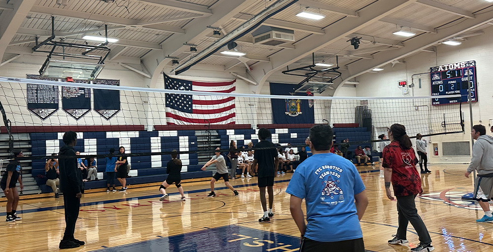 Teachers & Staff get Served in Volleyball Game Against SAS Students 